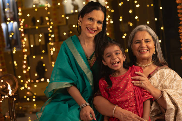istock Three generation female family embracing at home during Diwali 1747965109