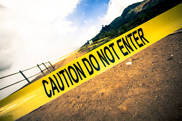 istock Caution Do Not Enter Yellow Tape Sign 174796685
