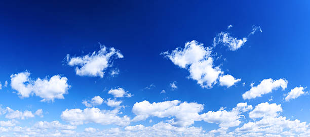 istock XXXL Cloudscape Panorama - Blue Sky and White Clouds 174797255
