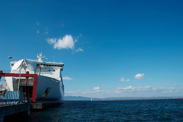 istock Open gate of ferry against clear sky with copy space 174797362
