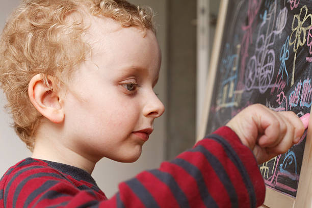 istock Little boy drawing a picture 174797394