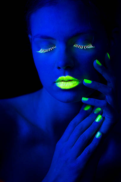 istock Young Women Portrait with Lime Green Fingernails in Neon Light 174797767