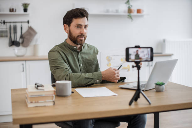 istock Economic expert creating new video for his business vlog 1747983162