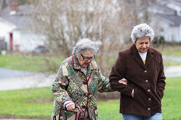 istock Senior Mother and Mature Daughter Walking 174798608