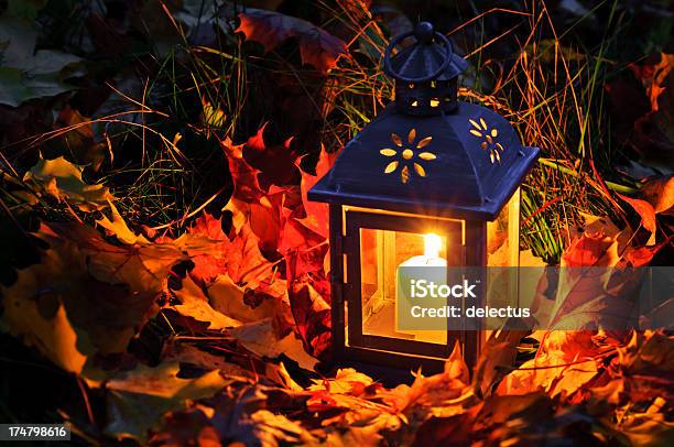 Lantern In The Autumn Leaves Stock Photo - Download Image Now - Autumn, Burning, Candle