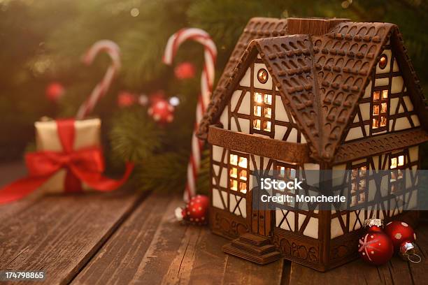 Mini Ceramic Cottage House With Christmas Decoration Stock Photo - Download Image Now
