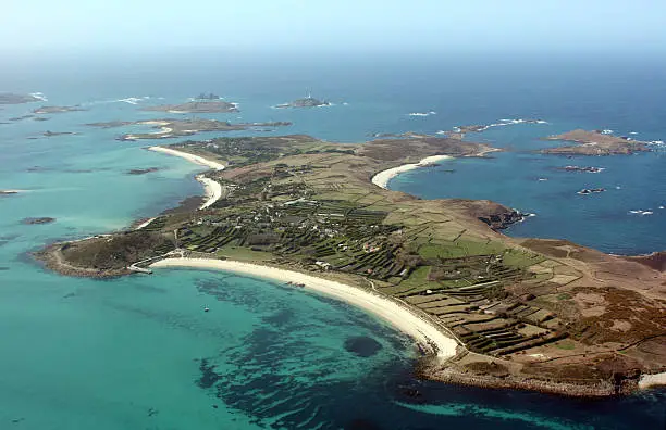 "Aerial view of the one of the isles of scilly - St. Martin's - off the south west coast of England, taken from a helicopter on a summers day"
