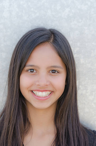 istock Happy Hispanic Girl Laughing 174799082