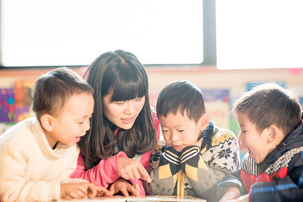 istock children and teacher in classroom 174799133