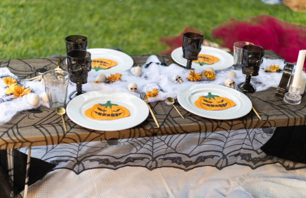 istock Table on a garden ready for a Halloween celebration 1747992933