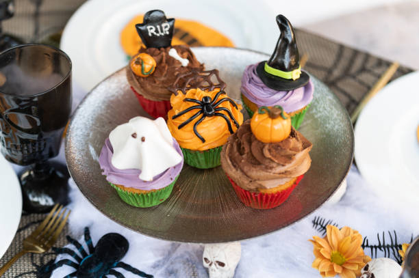 istock Various decorated muffins at table during Halloween party 1747993436