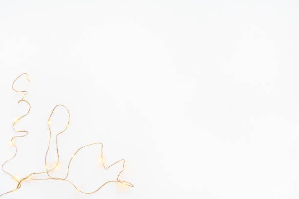 istock Square Christmas lights garland border over white background. Flat lay, copy space. 1747993456
