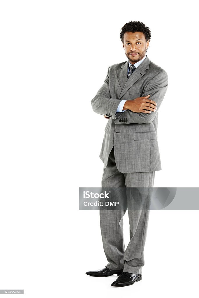 Empresário confiante em pé no fundo branco - Foto de stock de Braços Cruzados royalty-free