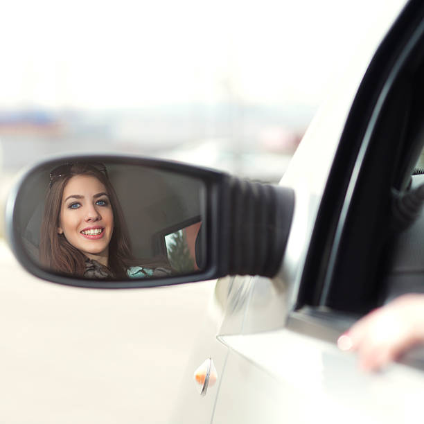 istock Happy young woman waiting in a car 174800346