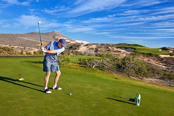 istock Golfer Teeing Off, Dunes Golf Course, Cabo San Lucas 174800402
