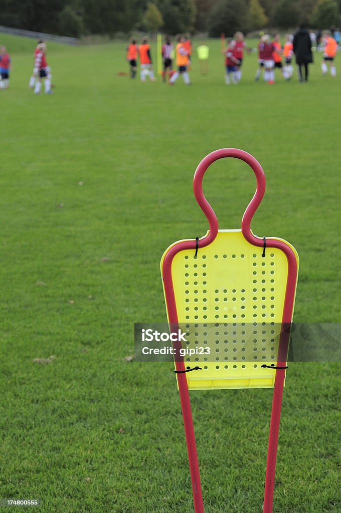 Football training Dummy goal post with footballers in the background Goal Post Stock Photo