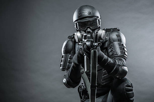 istock Powerful Soldier with Gas Mask and Bullet Proof Body Armor 174801089