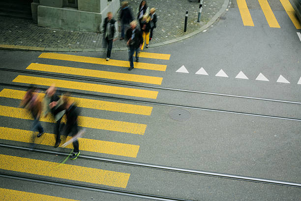 istock people crossing the street 174801111