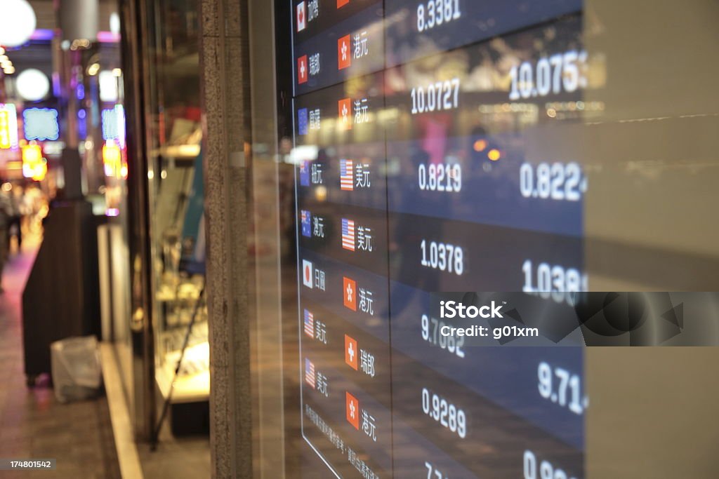 Global currency exchange rate charts Global currency exchange rate charts in Hong Kong. Exchange Rate Stock Photo