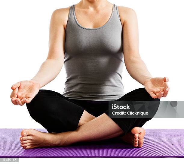 Young Woman Demonstrating Yogas Sukhasana Using Mudra With Fingers Closed Stock Photo - Download Image Now