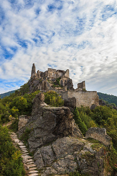 Kuenringer Castle Ruins, Dürnstein, Austria The Kuenringer Castle is a ruined castle overlooking the town of Dürnstein, famous for having been the prison of King Richard I Lionheart. Now it is almost completely destroyed, but the the footpath that starts in the old town and leads to the castle offers spectacular views of the Danube River e the Wachau with the expanse of vineyards that cover the countryside. durnstein stock pictures, royalty-free photos & images