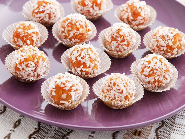 Homemade carrot candies with sugar and nuts