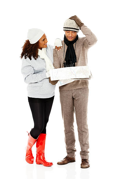 istock Happy couple looking for directions in a map 174802937