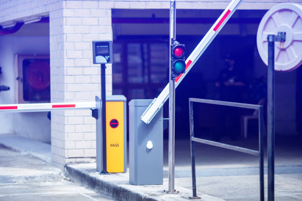 istock Selective focus to signal light of automatic barrier gate system. Parking and automatic payment system with licence plate recognition. 1748036431