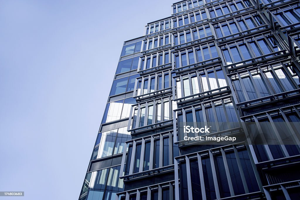 Office Facade Modern glass office building facade and blue sky Architecture Stock Photo