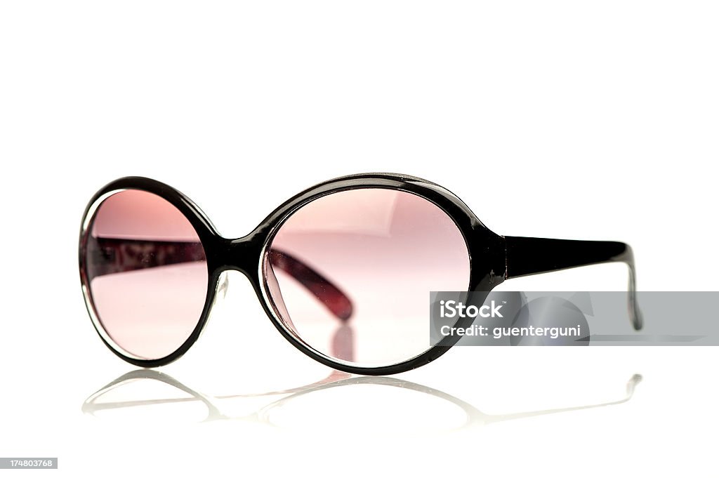 Gafas de sol de moda en negro con gafas rosa. - Foto de stock de A la moda libre de derechos