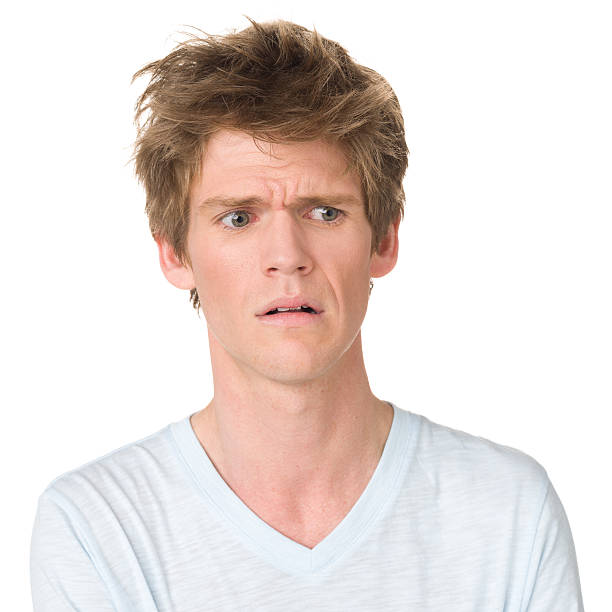 istock Worried Frowning Young Man 174803866