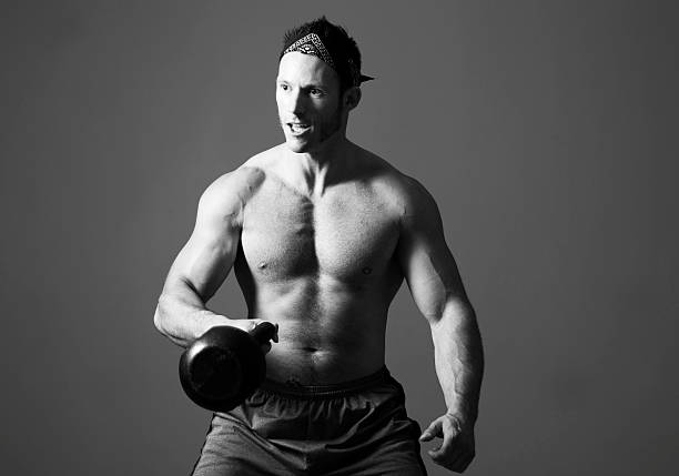 Working out Working out with a kettlebell. kettlebell chest ripl fitness