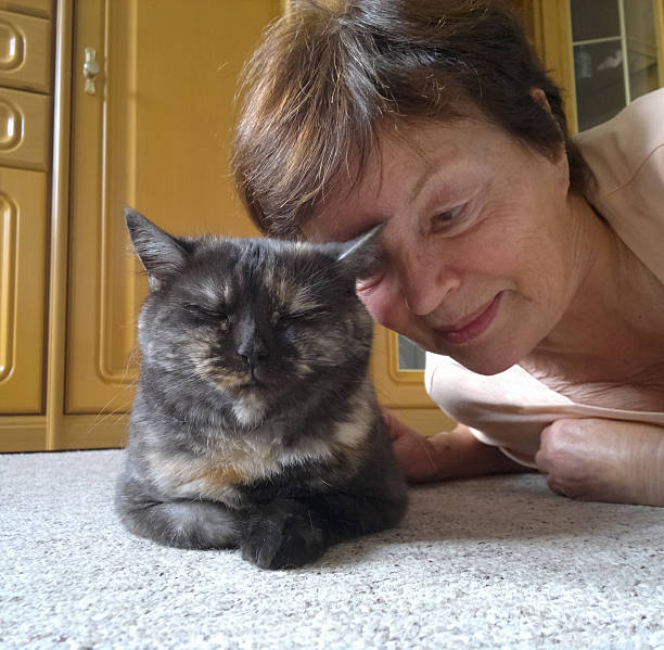 istock Senior woman and cat 174804353