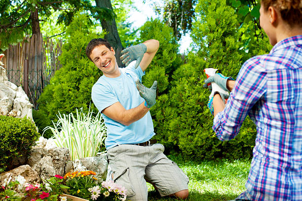 istock Young Couple Gardening and having fun 174804393