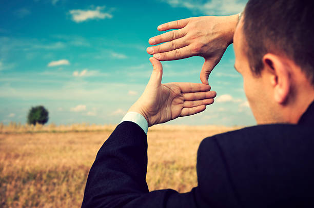 istock Businessman creates a composition of hand. 174804400