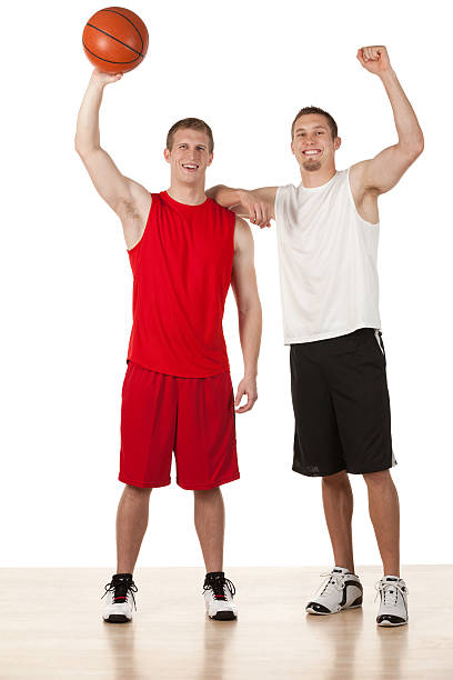istock Two basketball players celebrating their success 174804711