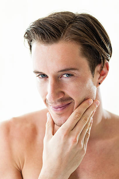 istock Portrait of confident handsome young man 174804804