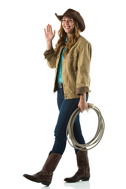 istock Happy cowgirl waving hands 174804845