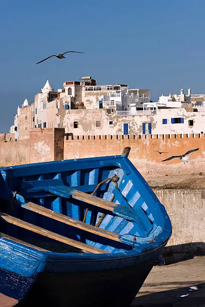"Fishing boat with the town of Essaouira, Morocco in the background."