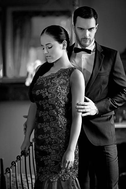 istock well dressed sensual couple posing indoors 174805140