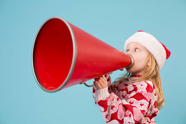 istock Santa's Little Helper Making Announcement With Megaphone 174805335
