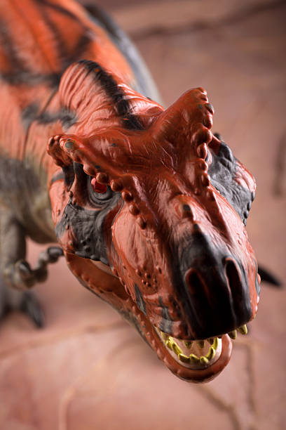 istock Aggressive Tyrannosaurus Rex on Blue 174805402