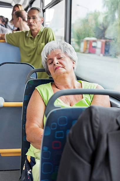 istock Tired senior woman commuting by bus. 174805452