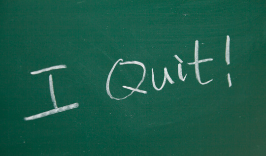 Black Board with I Quit! written on it by white chalk.