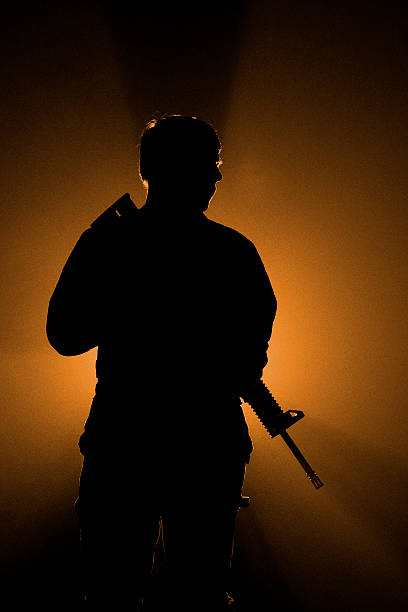 istock Assault Rifle Fog Silhoette 174806025