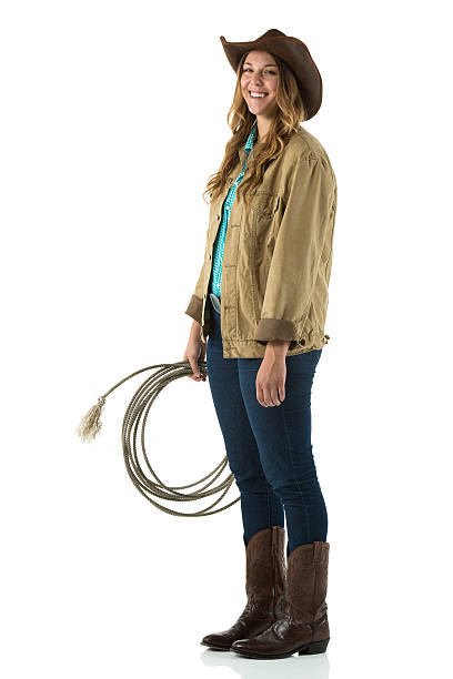 istock Smiling cowgirl holding a lasso 174806070