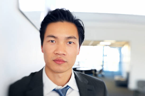 istock Confident young businessman looking at you 174806514