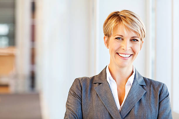 istock Cheerful middle aged business woman 174806765