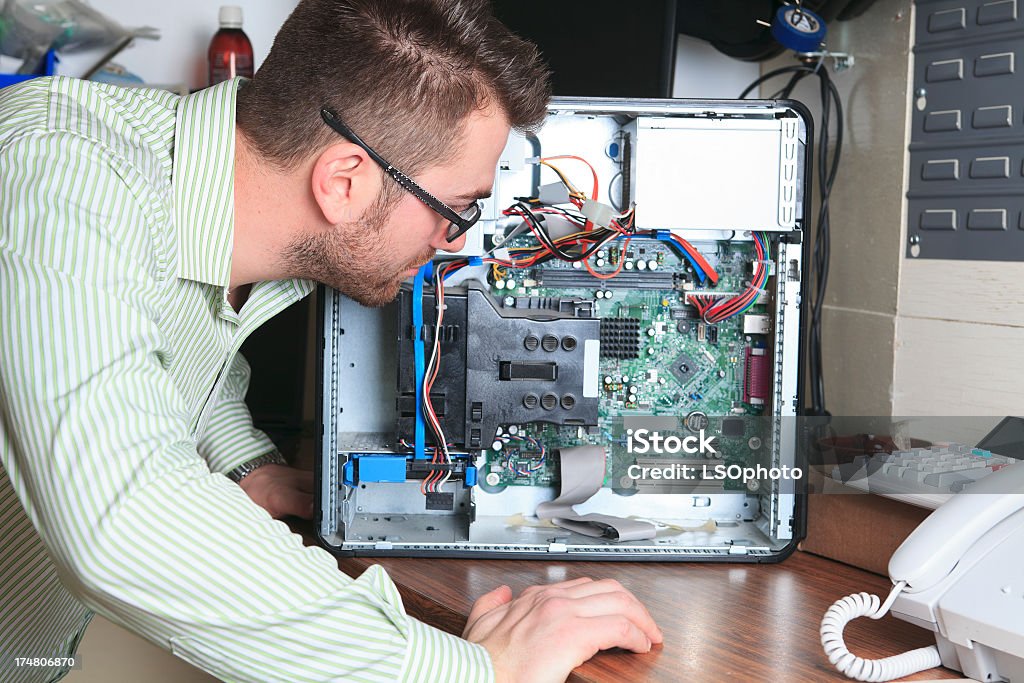 Electronics Engineer - Watching Computer Store Stock Photo