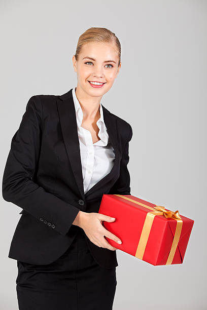 istock Businesswoman with gift box 174807134